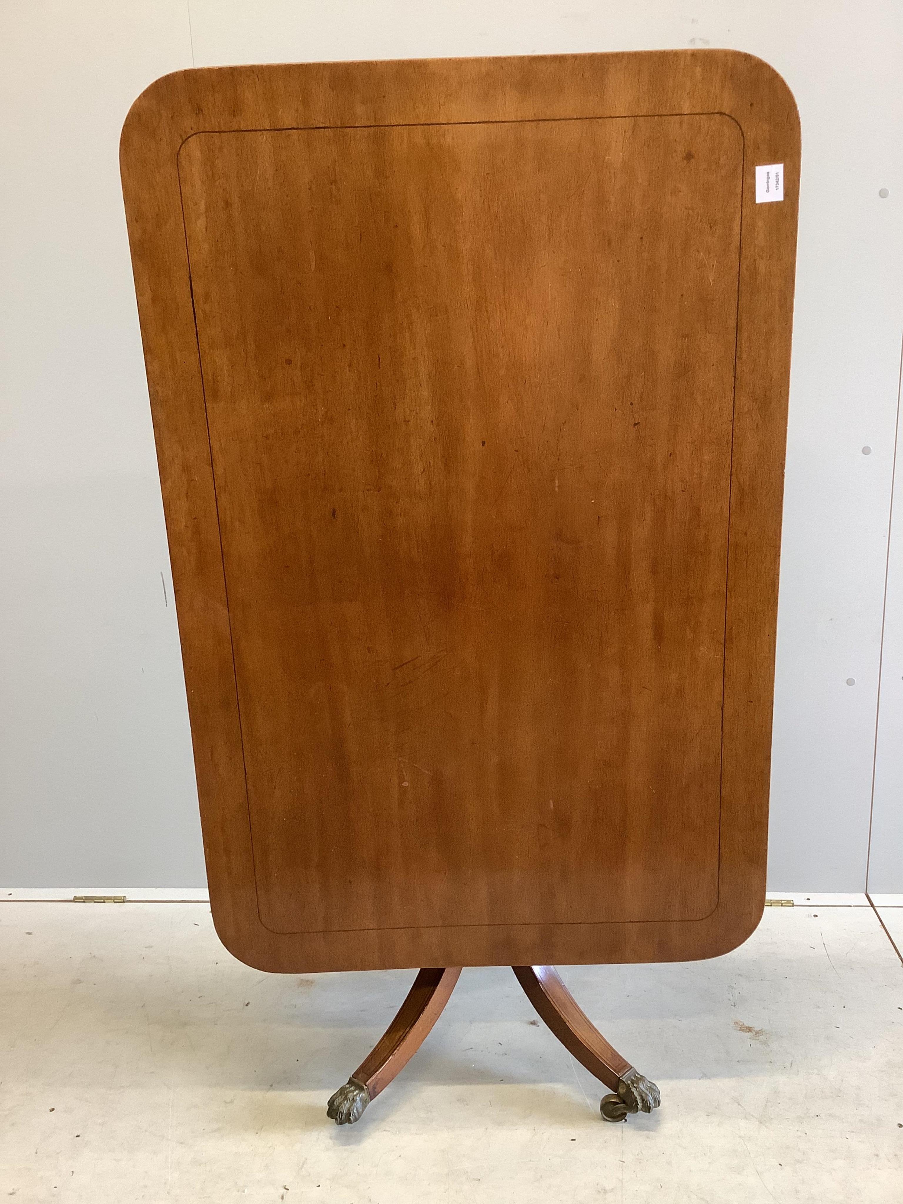 A George III rectangular mahogany tilt top dining table, width 79cm, depth 120cm, height 72cm. Condition - fair